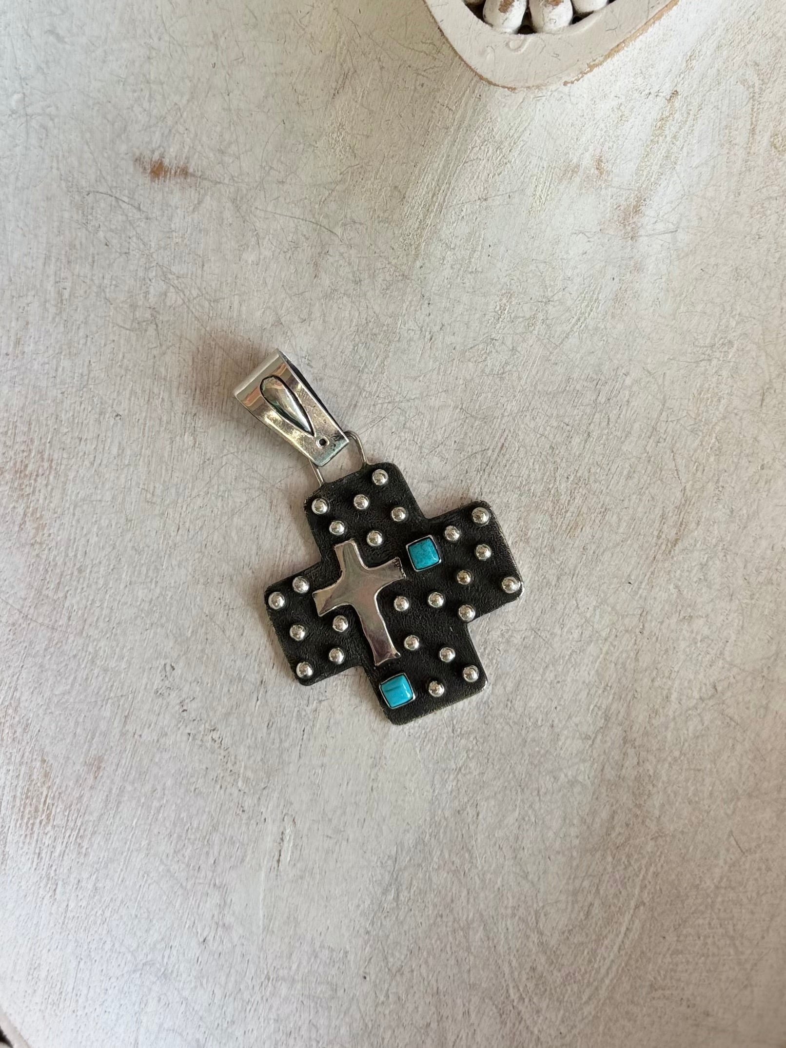 Cross pendant by Ernest Rangel