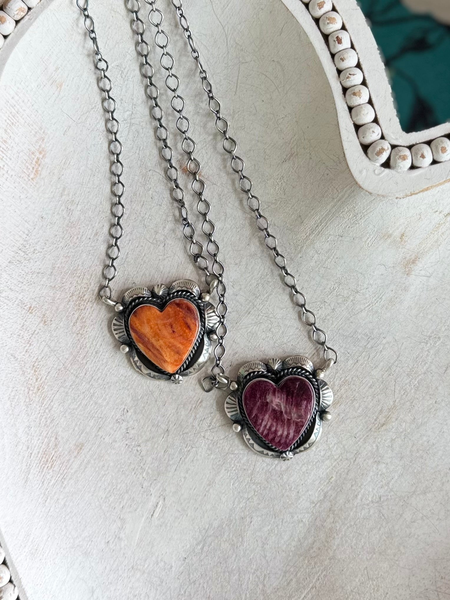 Spiny heart necklaces