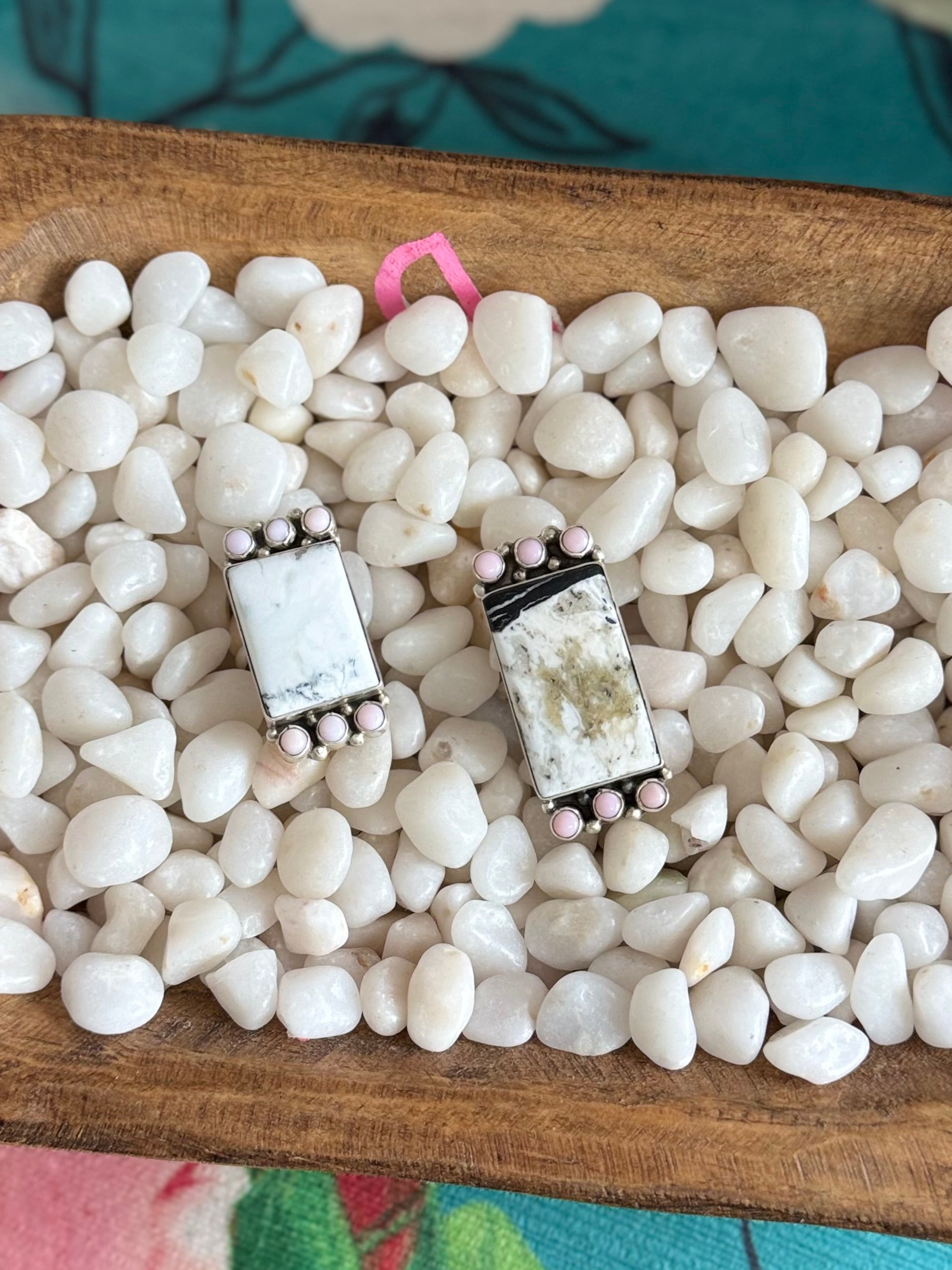 White buffalo and pink conch ring