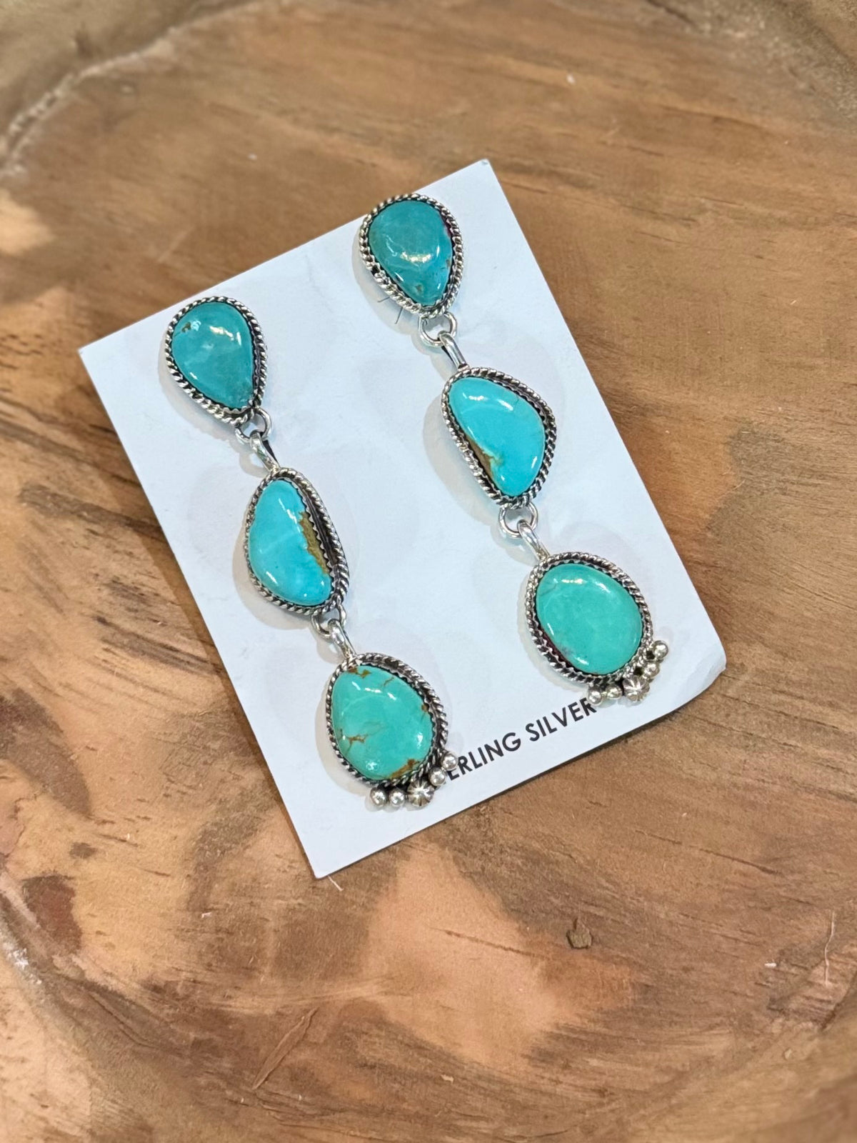 3 stone drop earrings